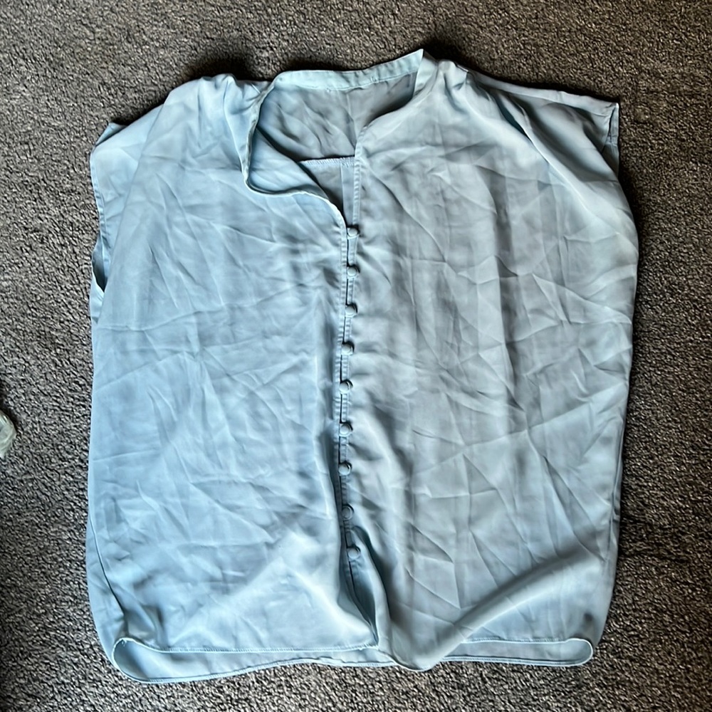 Blue blouse fits like an XL